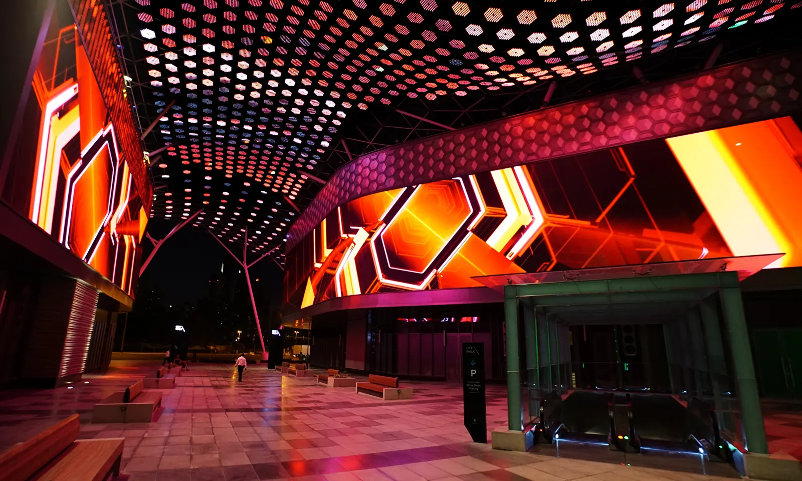 The lit canopy walkway at City Walk